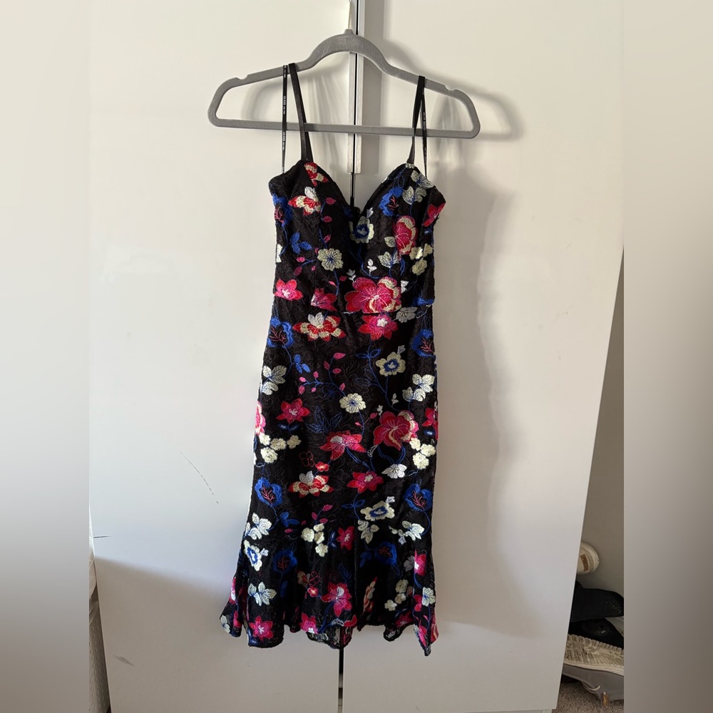 Guess black cocktail dress with embroidered flowers. Sexy and cute!